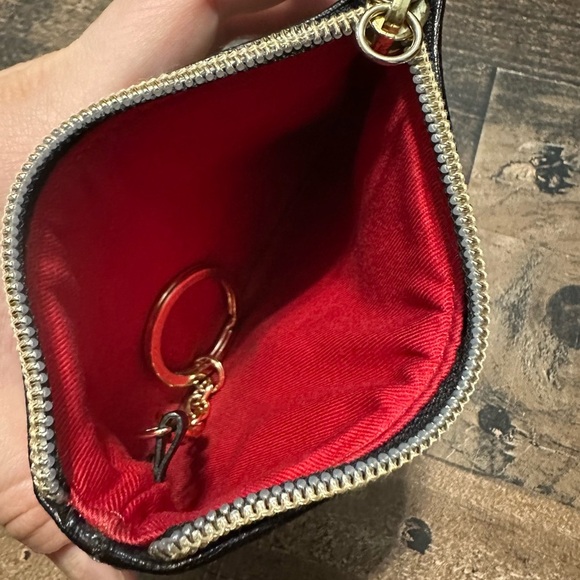 Dooney & Bourke Signature Pouch - Picture 5 of 6